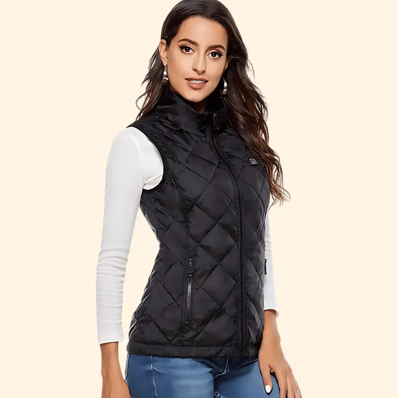 Woman wearing a black women’s heated gilet, demonstrating a stylish and slim-fit winter design.